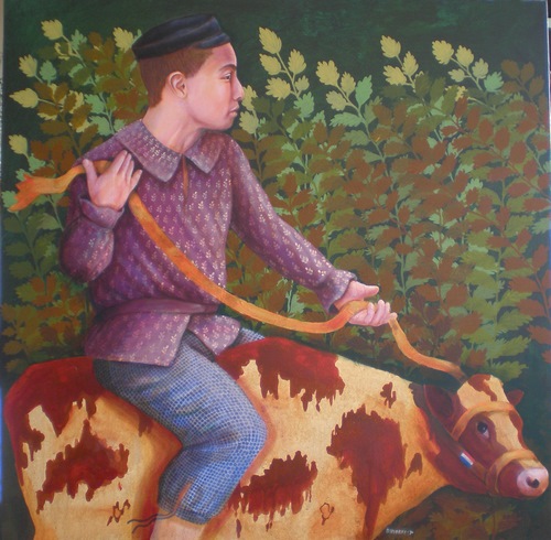 boy_on_cow.JPG